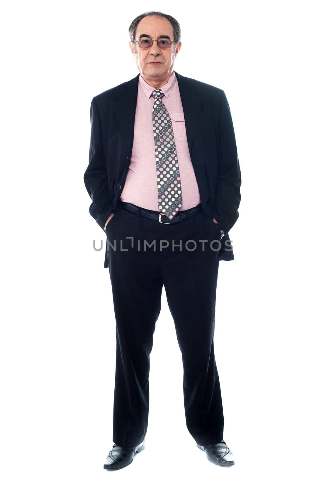 Senior executive, full length view by stockyimages