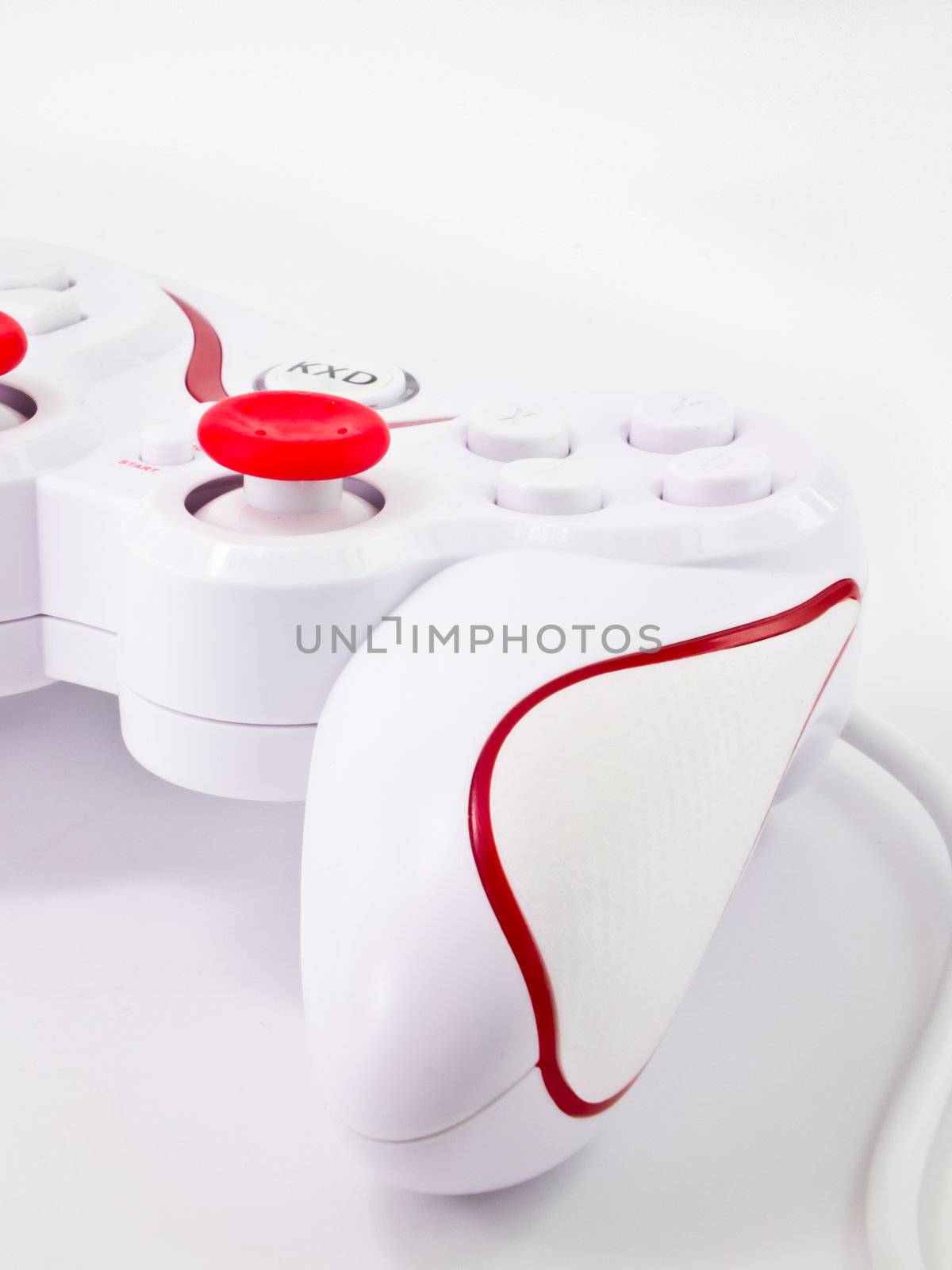 This is a half of white joystick on white background . It's have a shadow