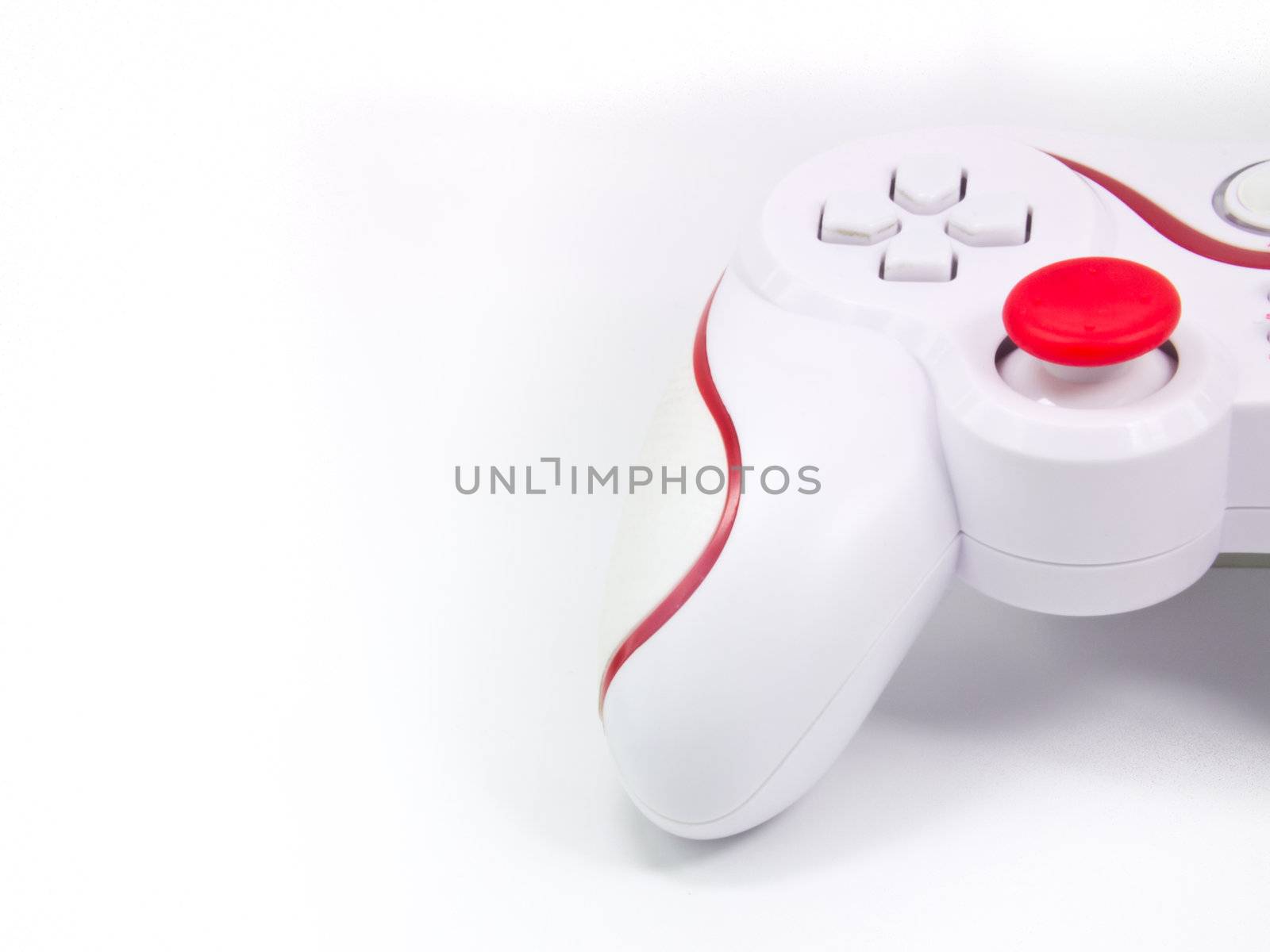 This is a half of white joystick on white background . It's have a shadow