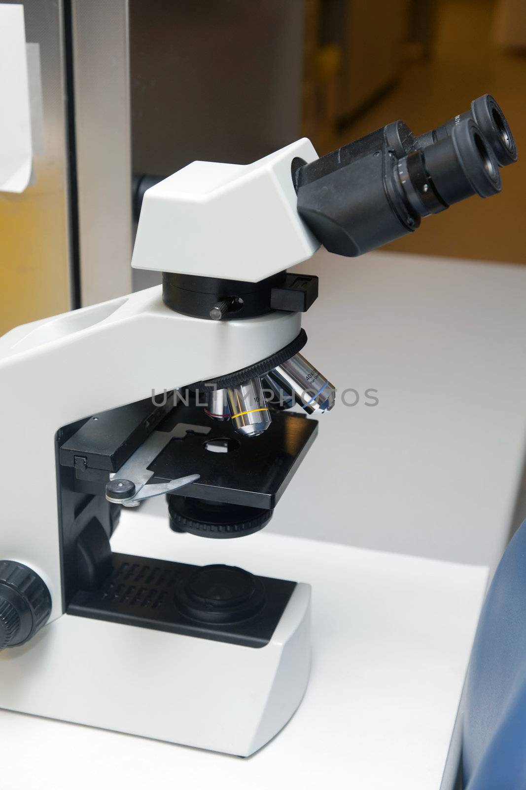 Microscope in a Laboratory by Portokalis