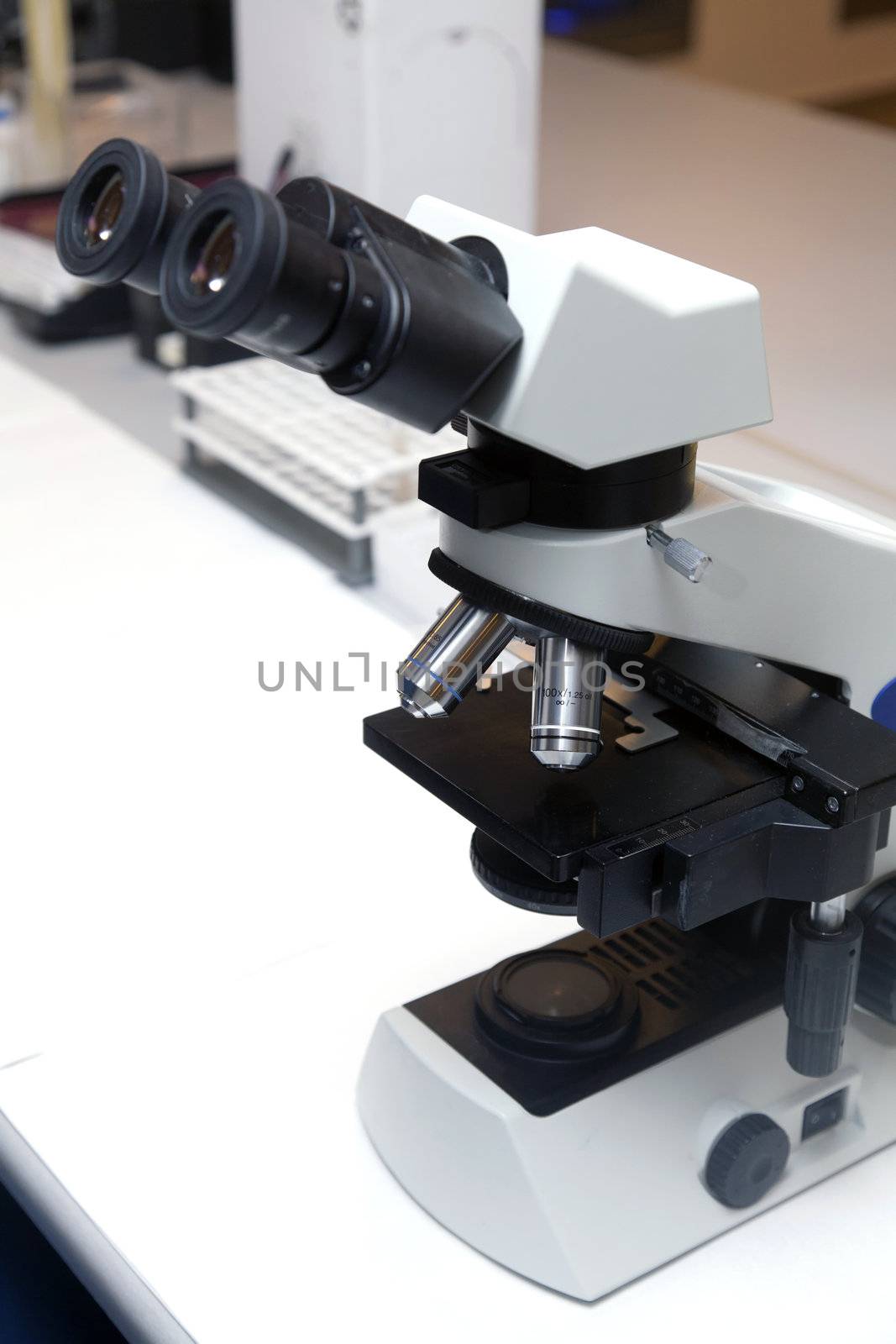 Microscope in a Laboratory by Portokalis