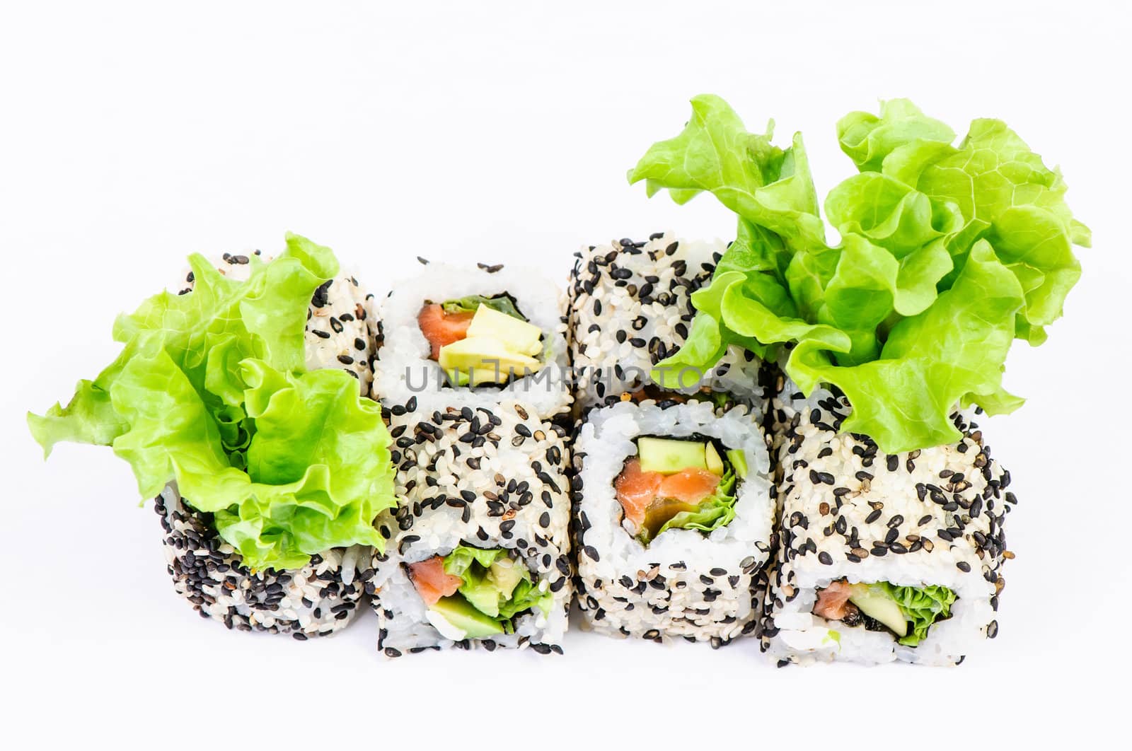 Sushi set with leaves salad on white background