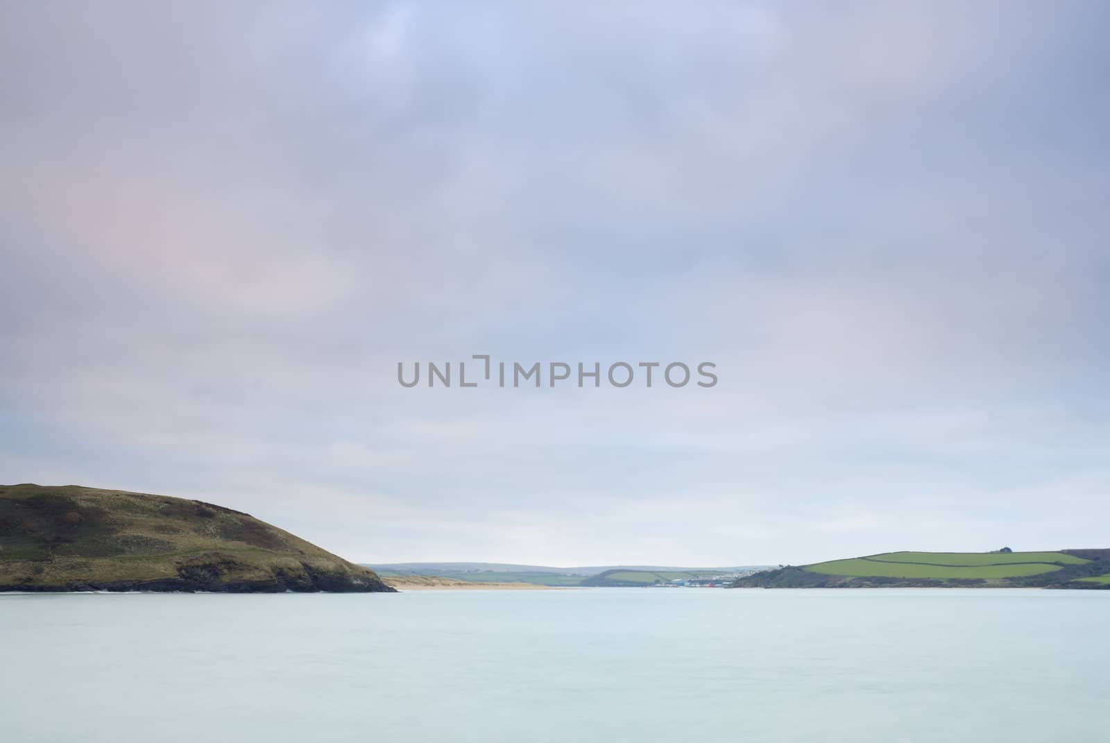 Cornish seascape shot in twilight. View up Camel estuary.