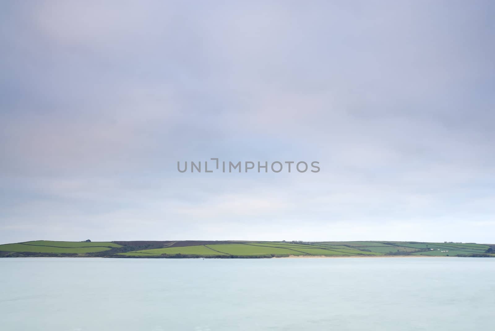 Cornish seascape shot in twilight. Motion blur in water.