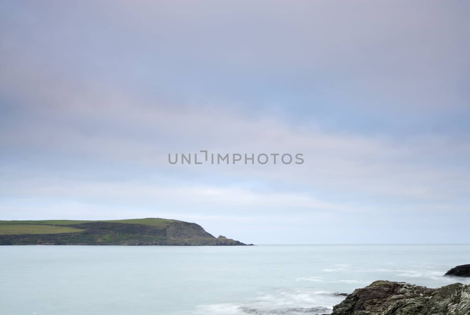 Cornish seascape shot in twilight. View to Stepper Point.