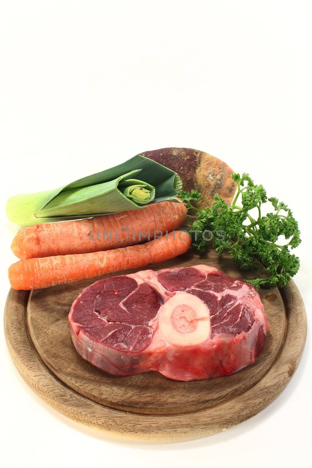 Cook meat and soup vegetables on a wooden board