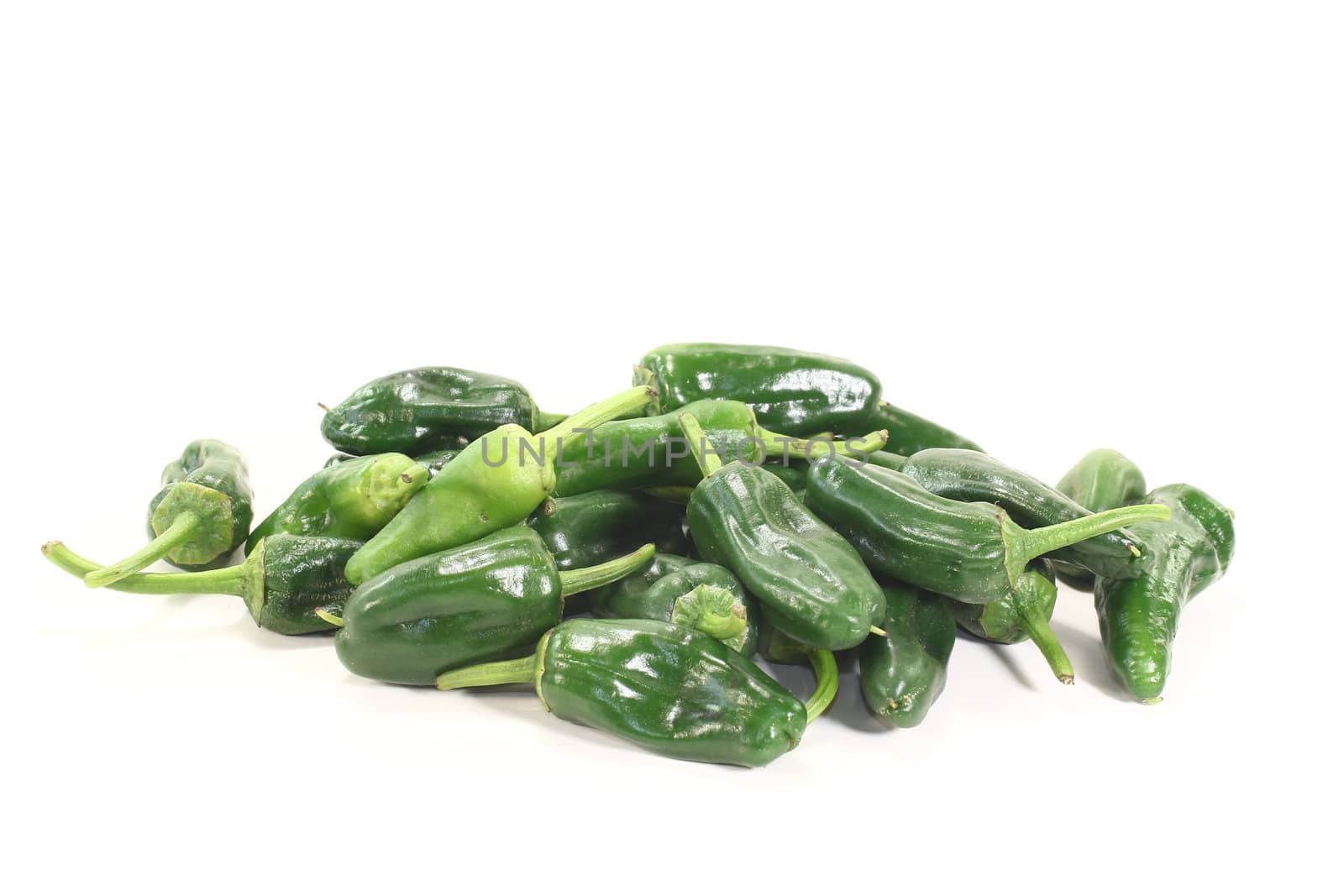 fresh raw green Pimientos on a light background