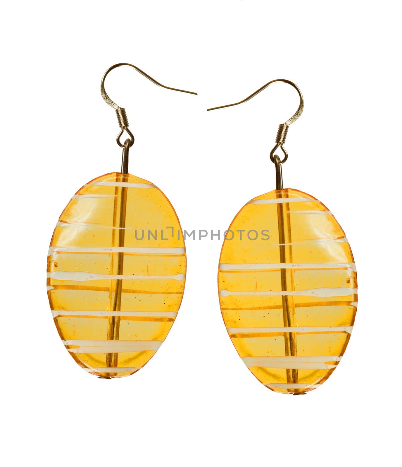 Earrings in yellow glass on a white background. Collage