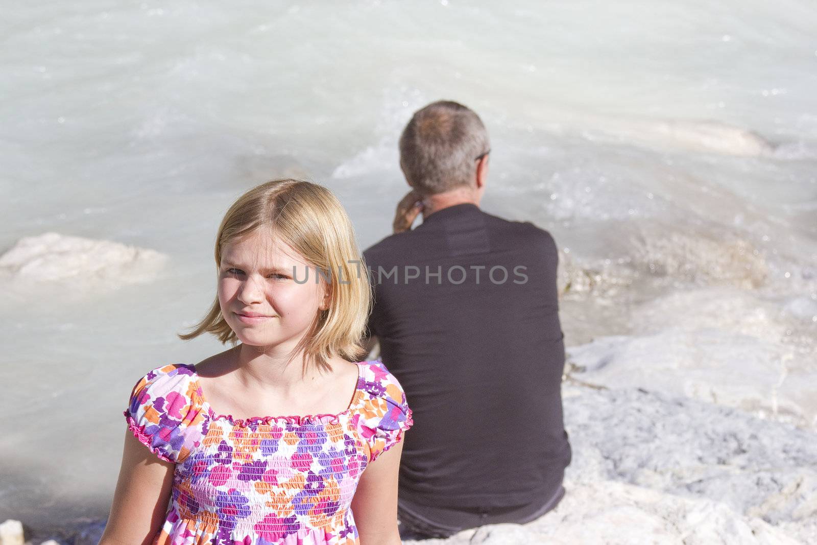 tourists resting on the river Soca in Slovenia by miradrozdowski