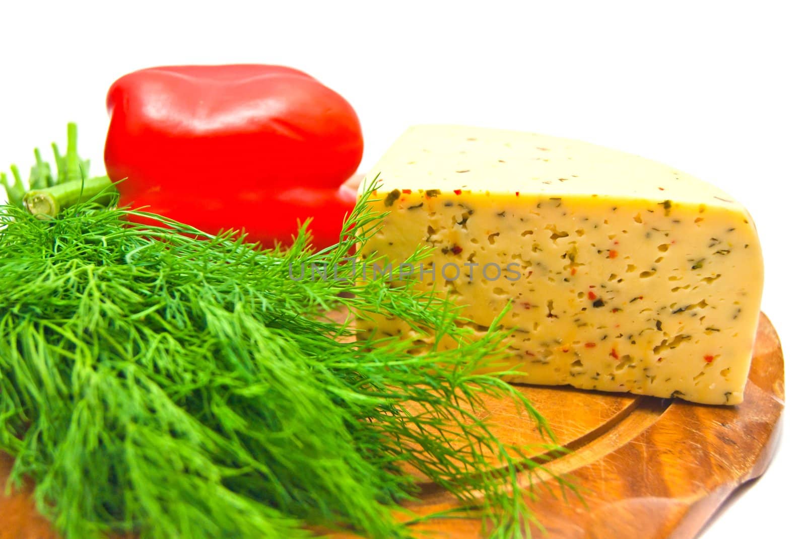 cheese with paprika on white background