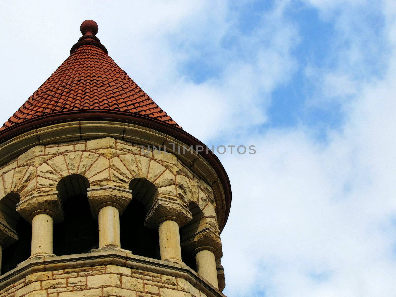 church steeple against beautiful blue sky with clouds