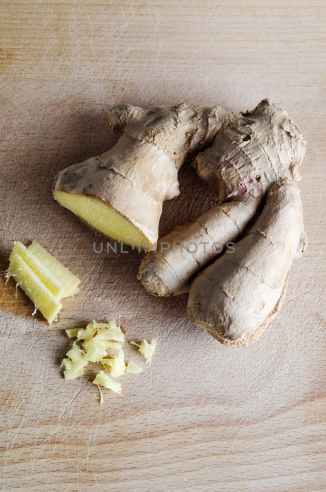 Ginger Root on Wooden Board by frannyanne