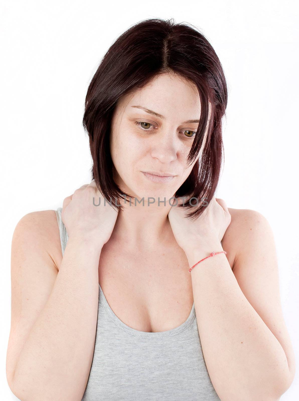 young woman with neck ache making massage to avoid pain