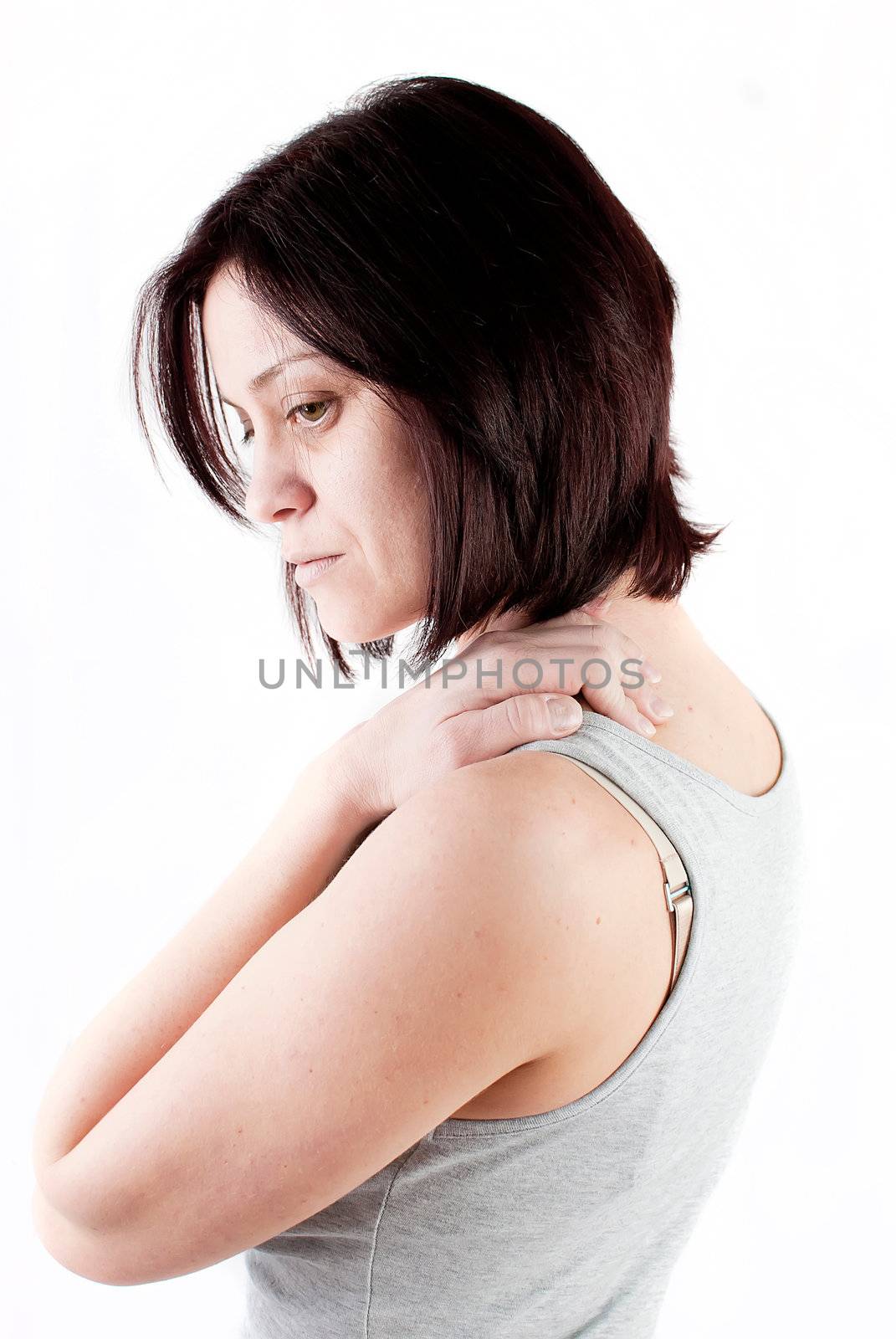 young woman with neck ache making massage to avoid pain