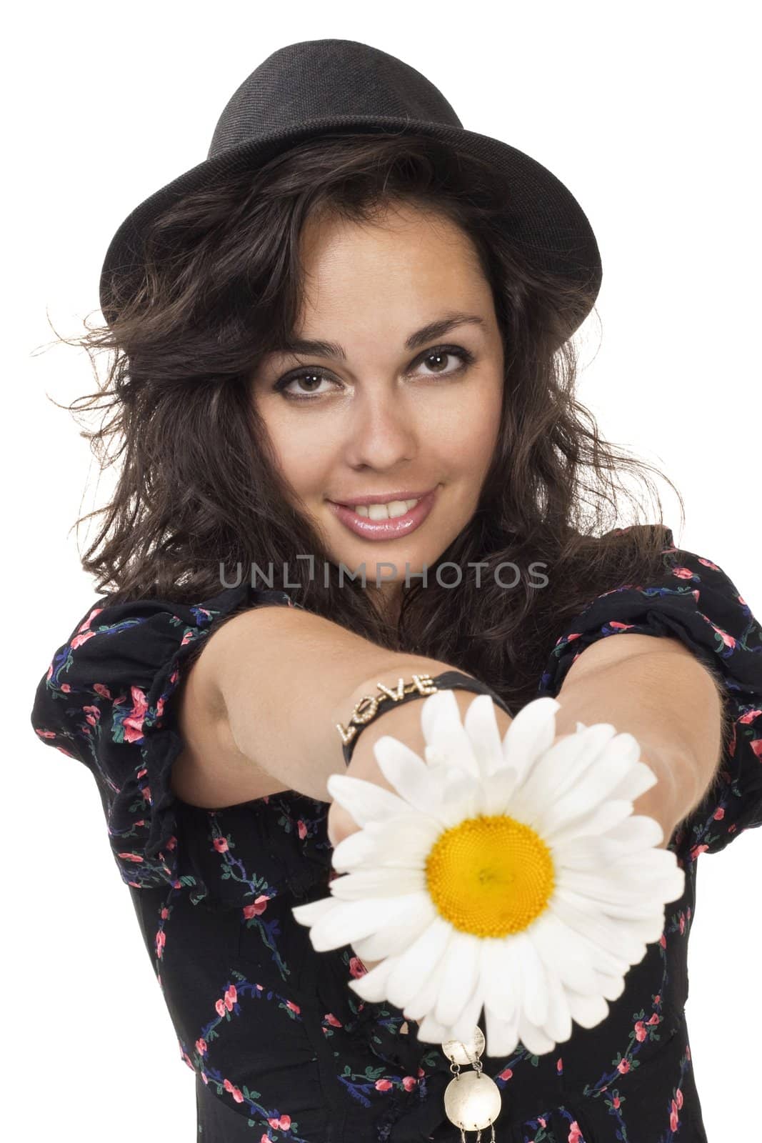 Image of a young playfully girl with camomile