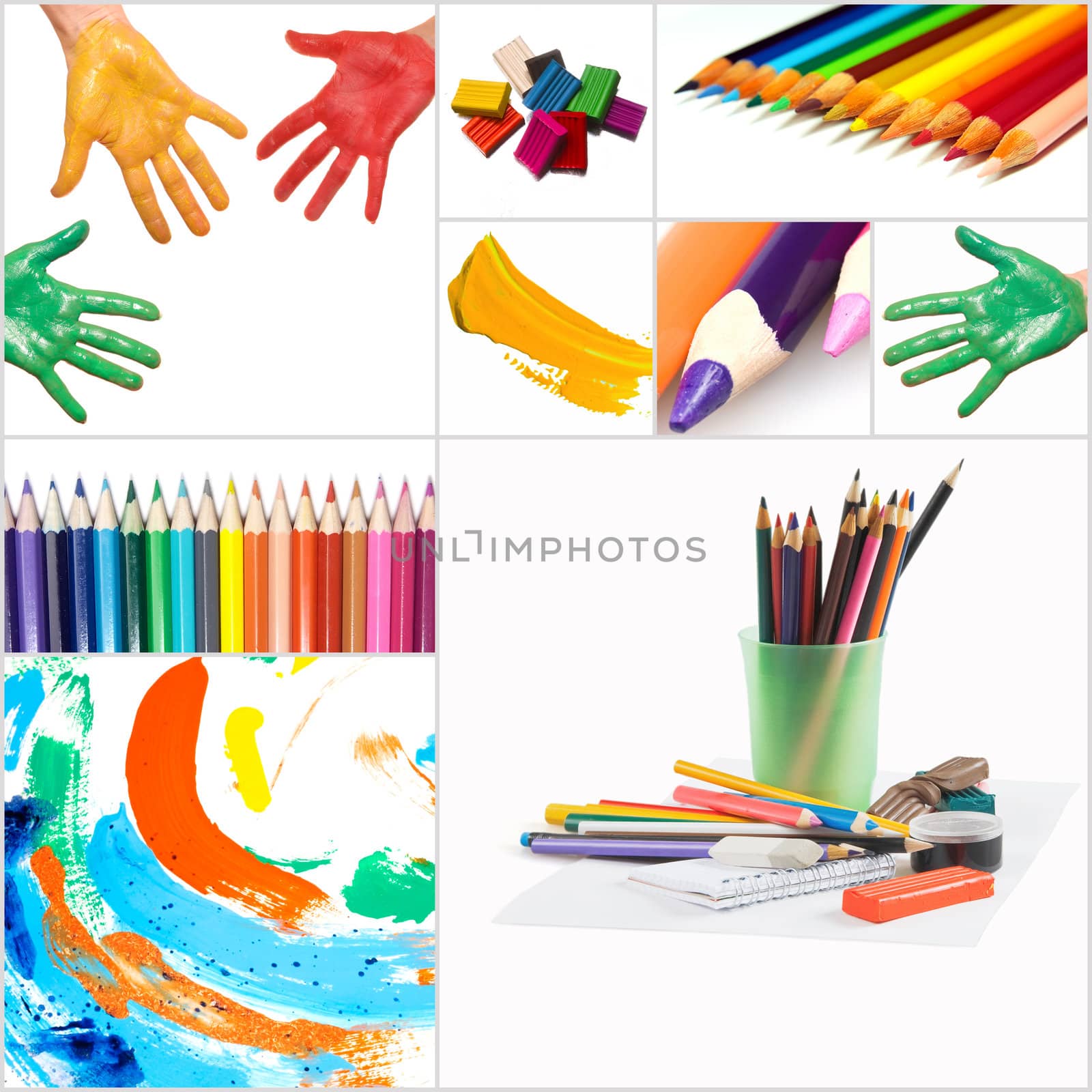 funny painted hand and pencils on white background