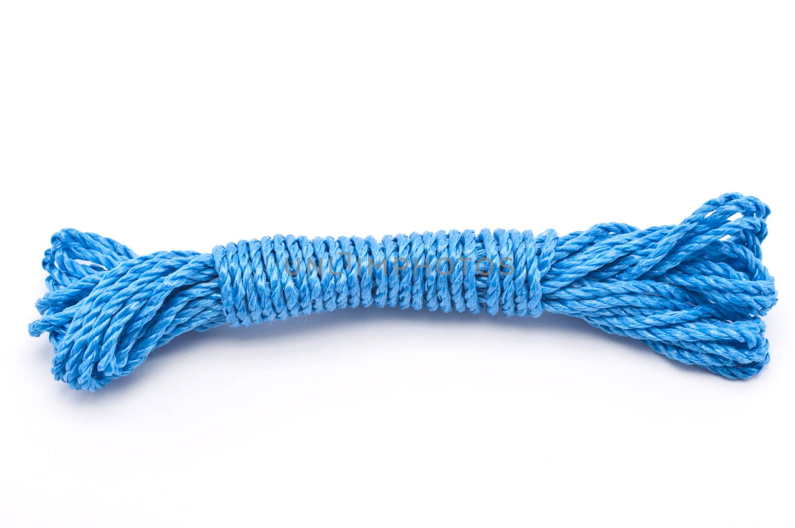 Stock picture of a coil and loop of blue rope
