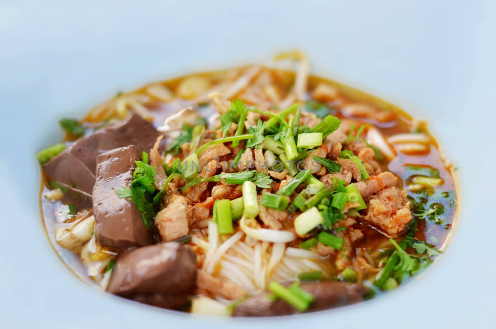  rice noodles with spicy pork sauce , Thai cuisine