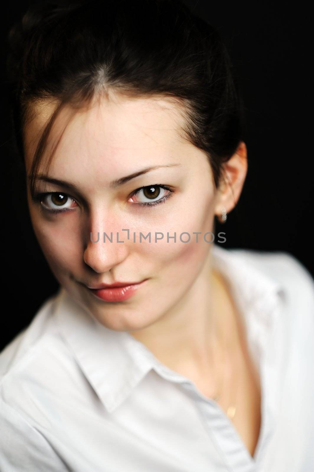 An image of a portrait of a beautiful young woman