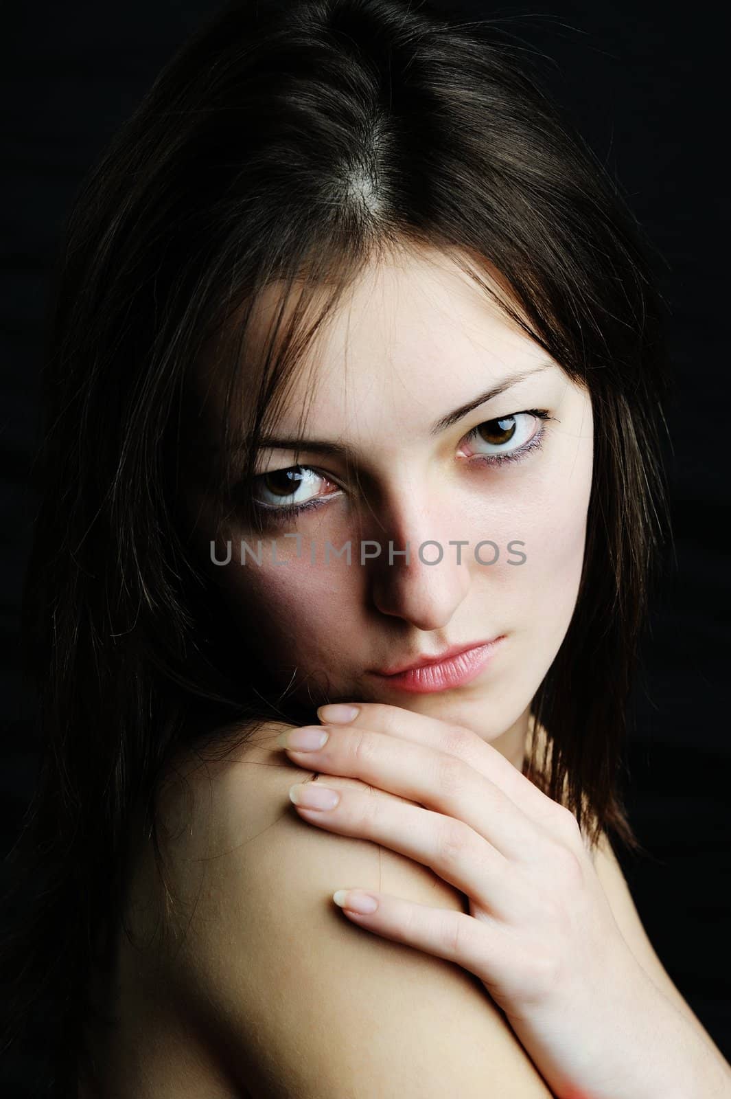 An image of a young beautiful woman close-up