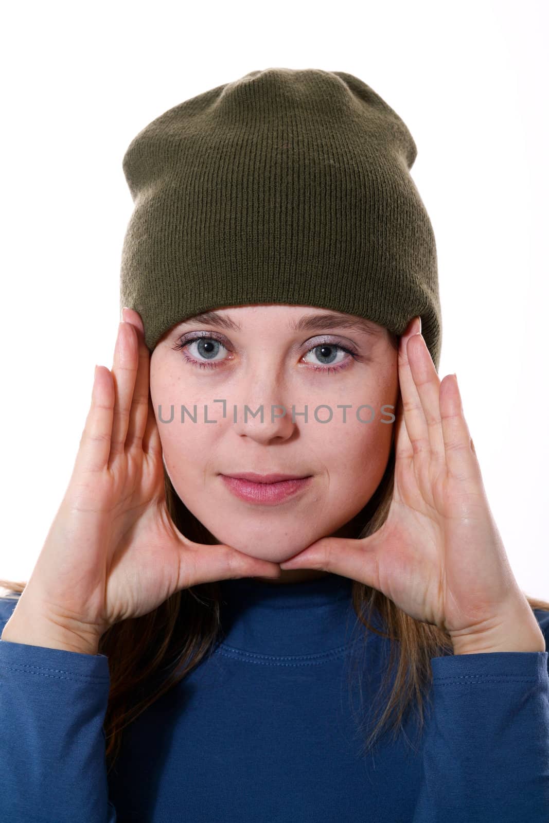 An image of a girl in a green hat