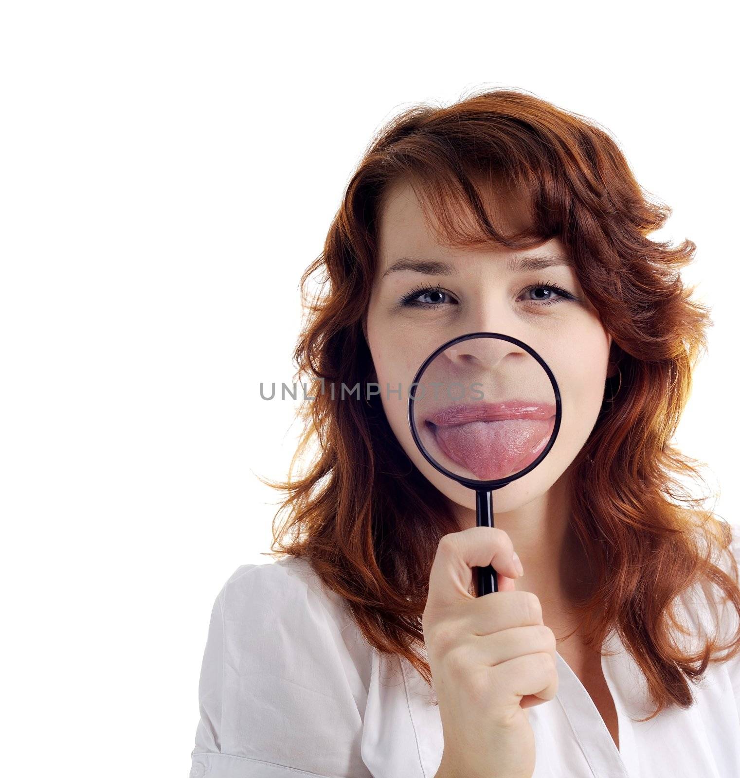 A nice woman with magnifying glass showing her tongue