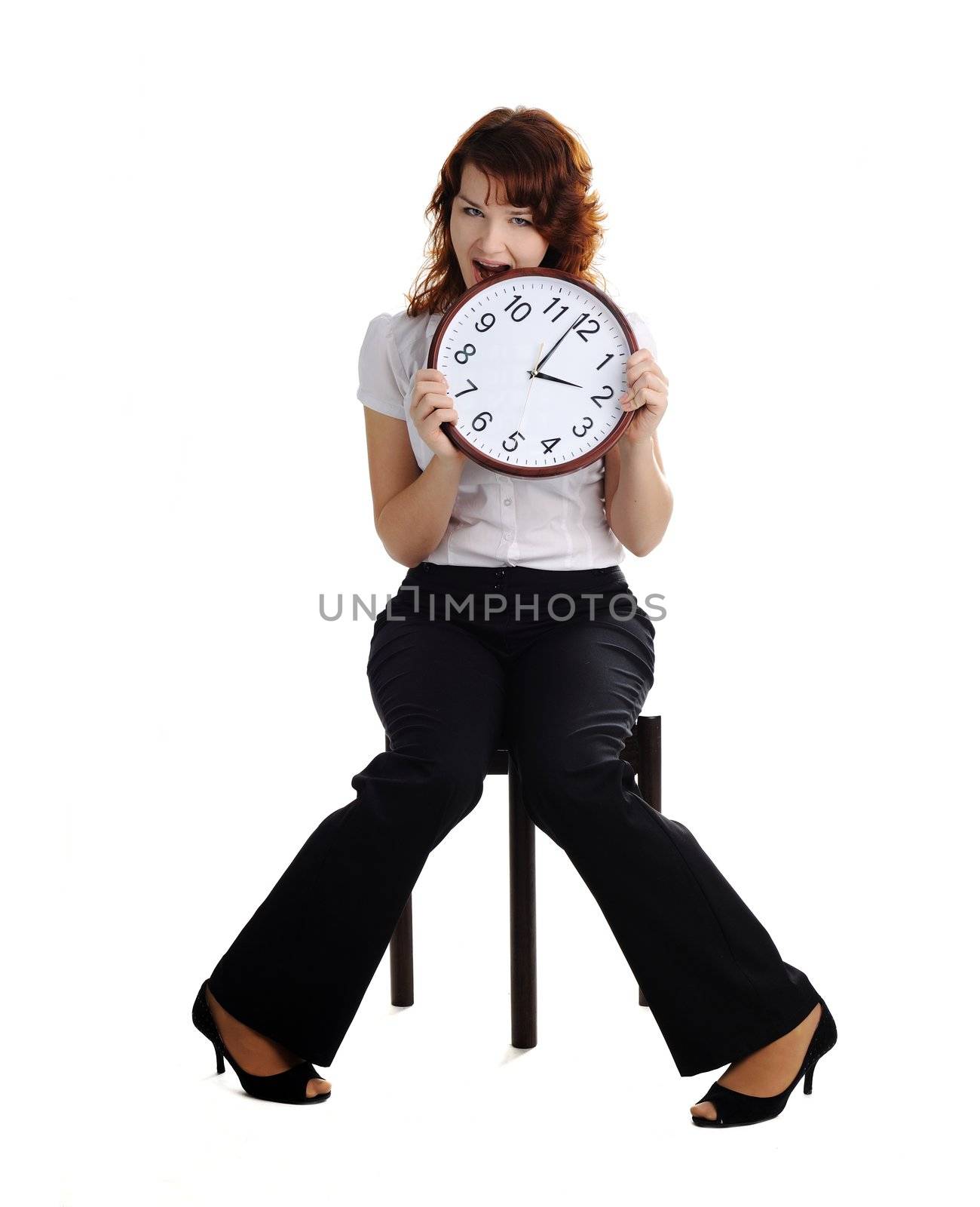 A portrait of a beautiful woman with a big clock