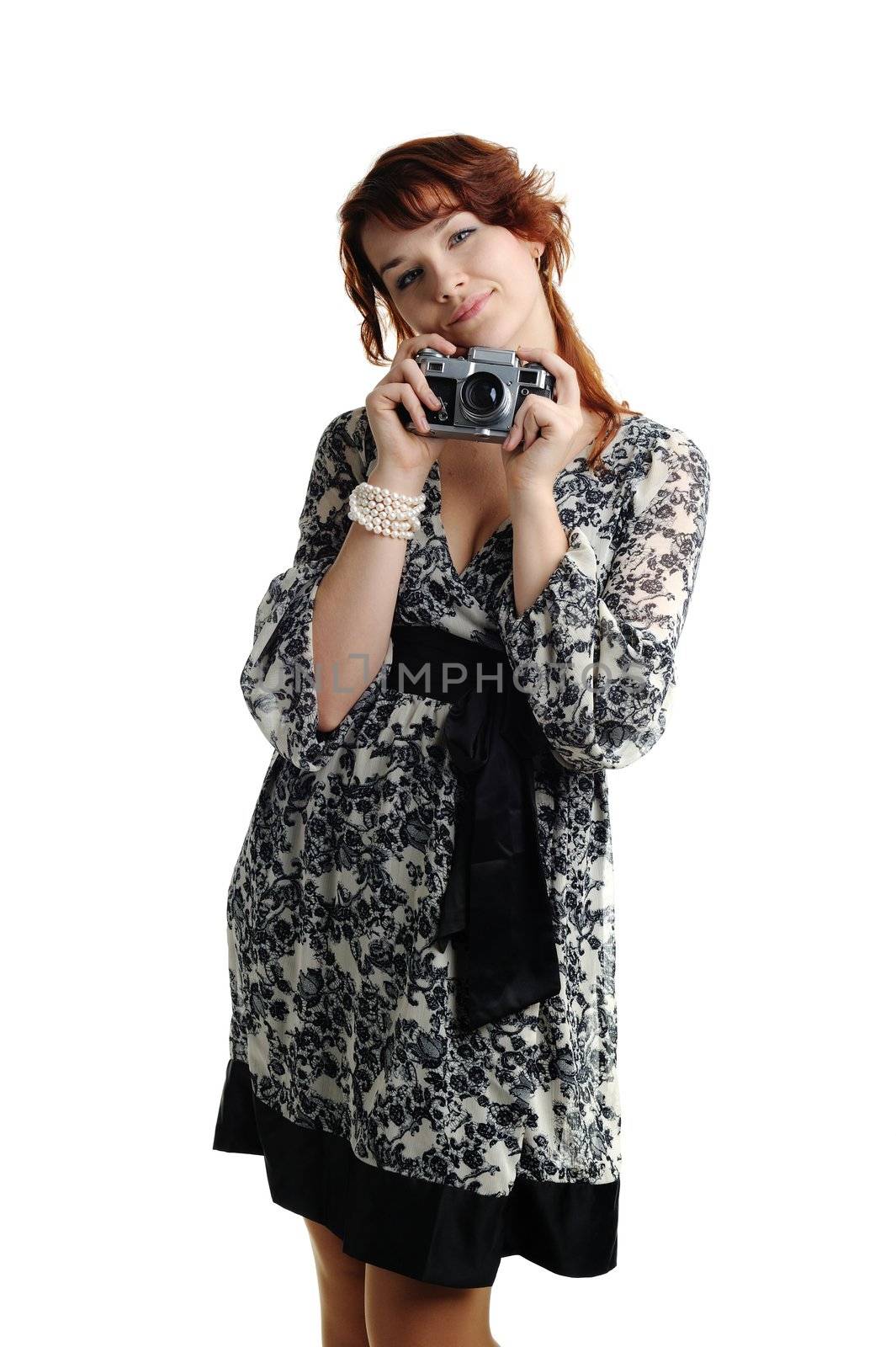 An image of a young woman with a camera