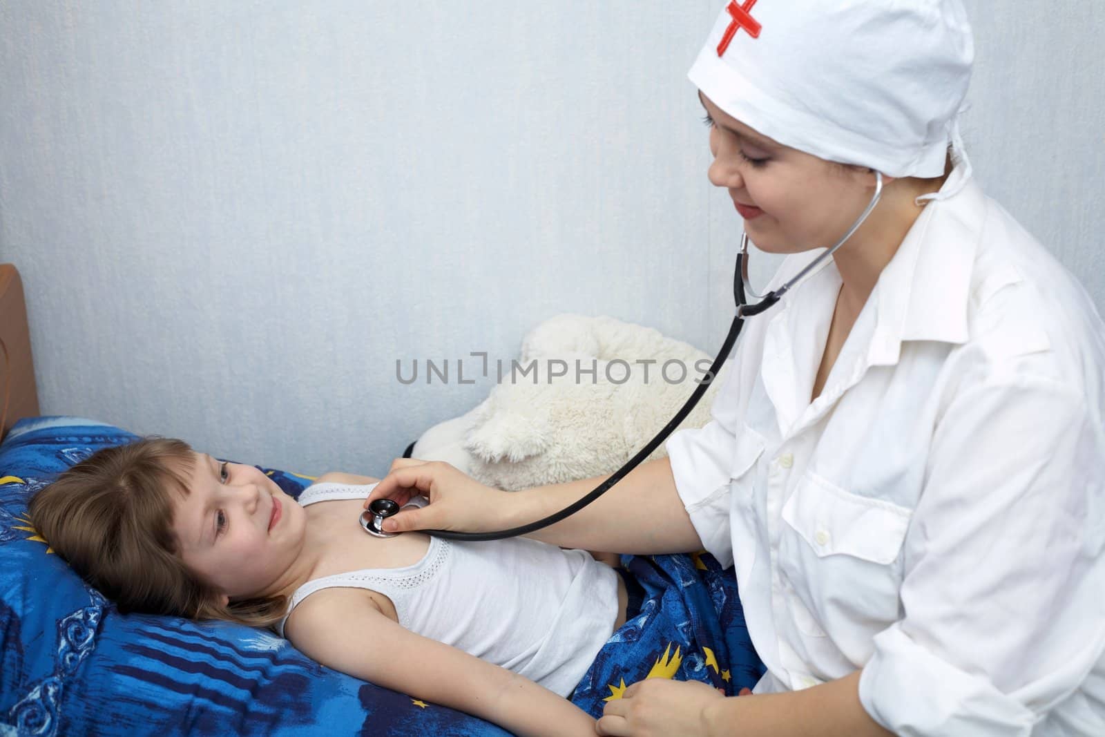 An image of a doctor and child