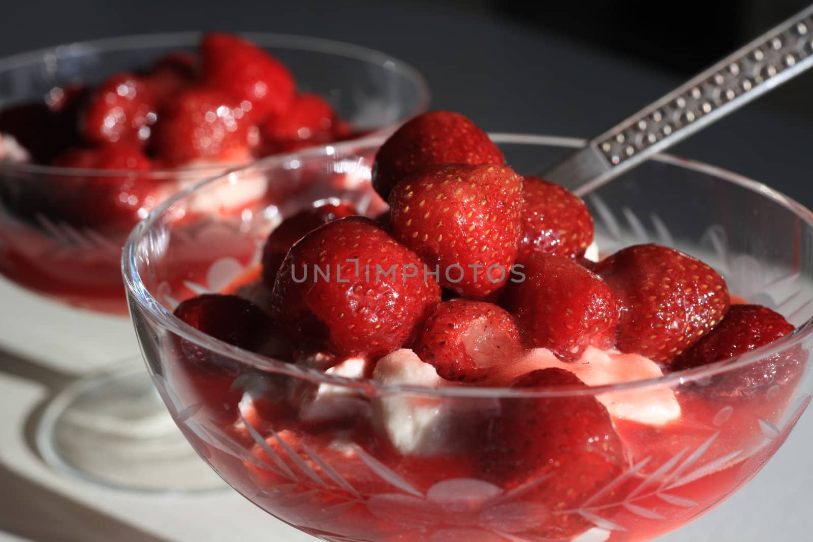 Portion of fresh strawberry dessert on the table close-up