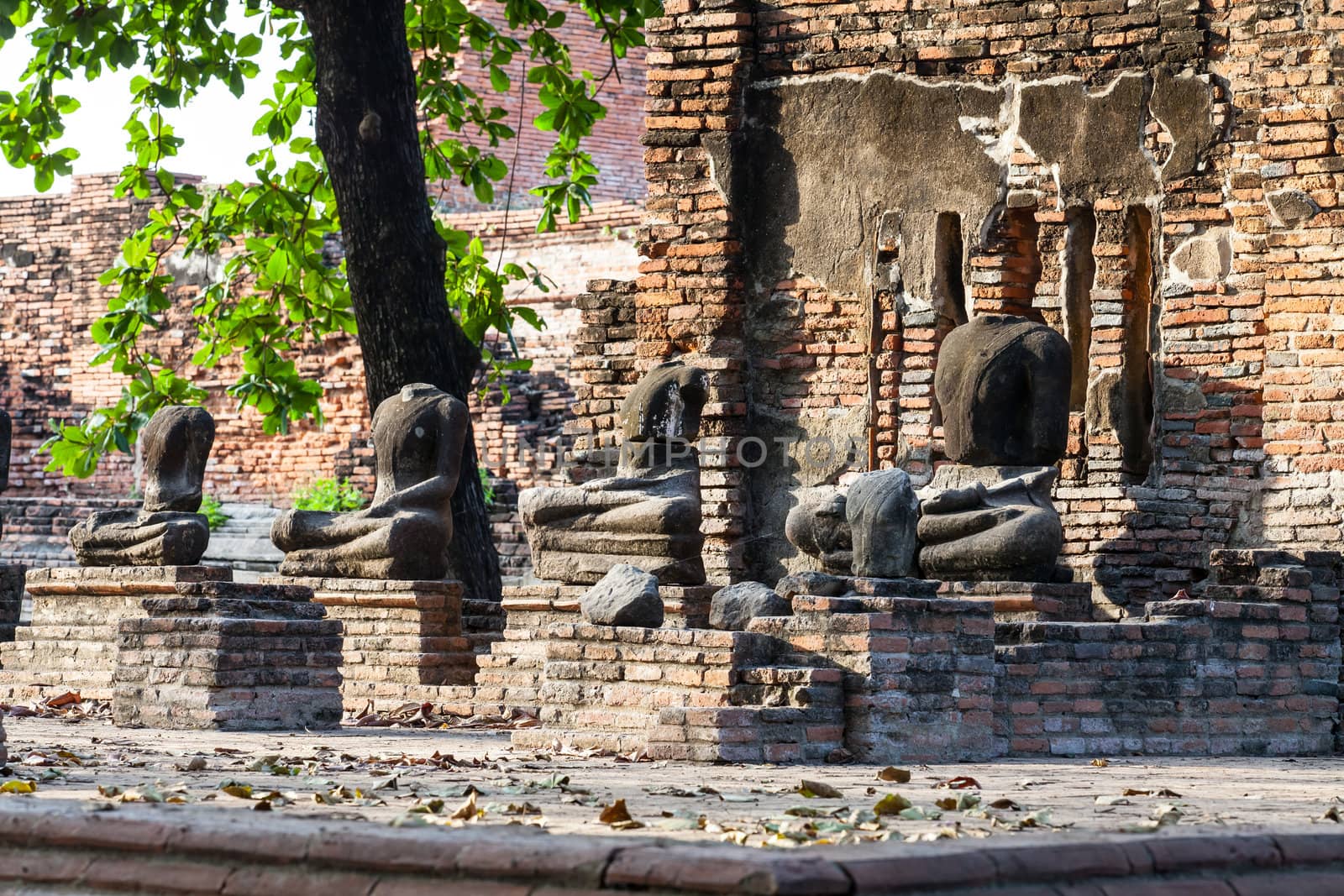 Ruin of Buddha statues in  historical park, at Wat Mahathat, Ayutthaya, Thailand