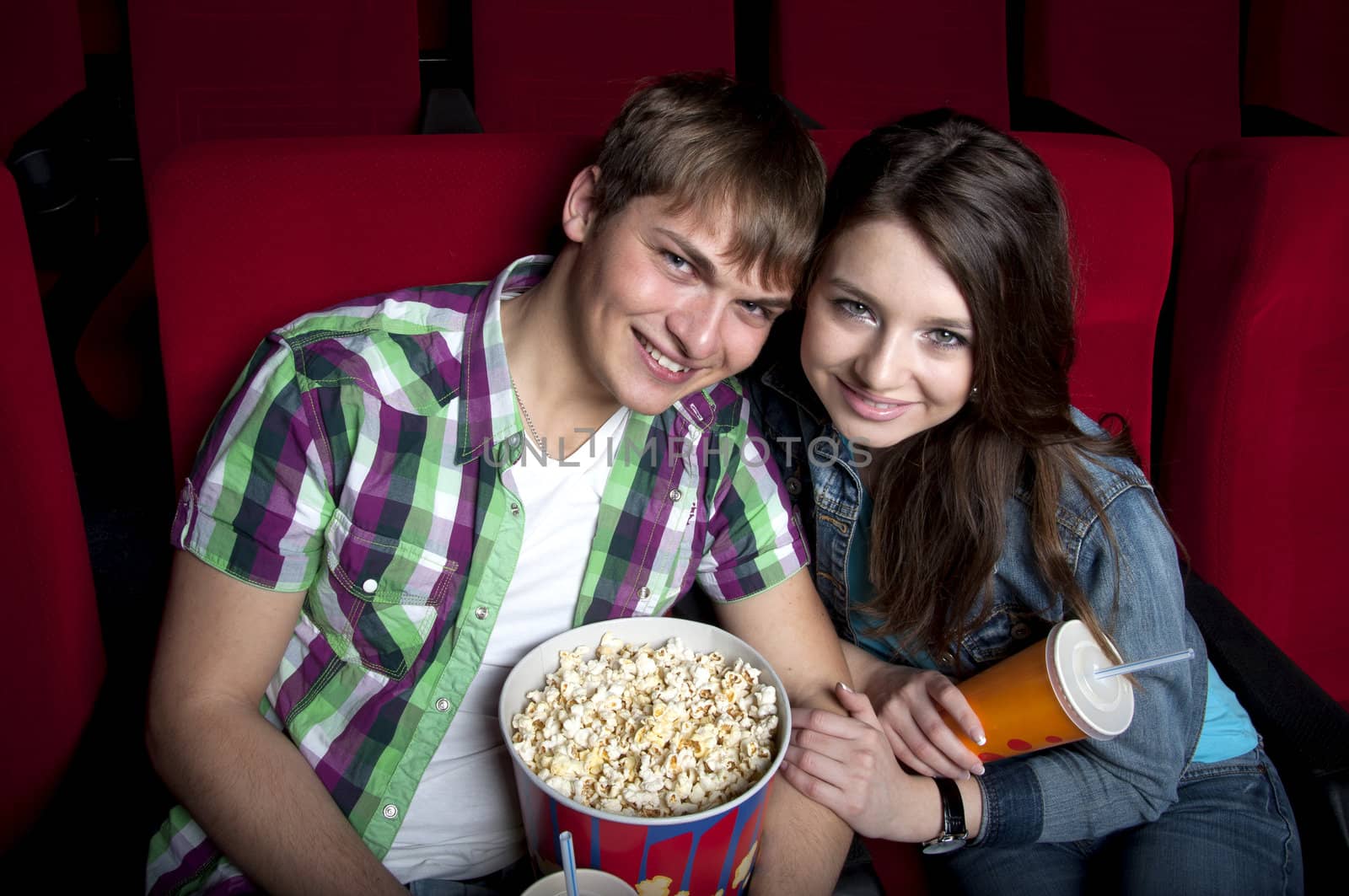 couple in a movie theater, watching a 3D movie