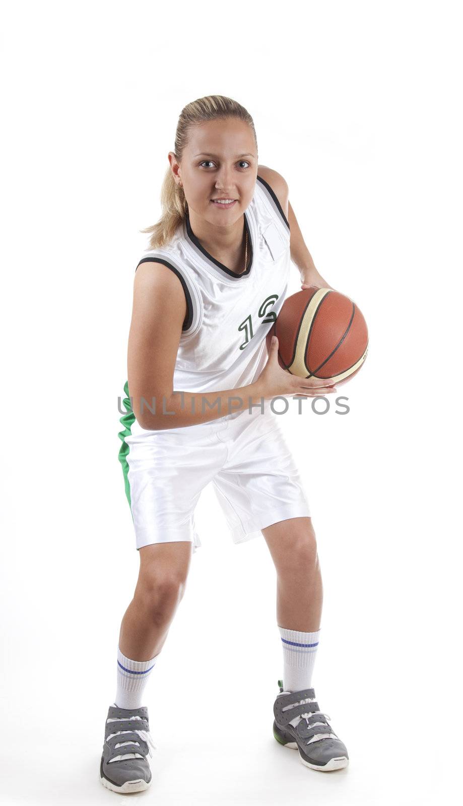 Attractive female basketball player, isolated on white background 