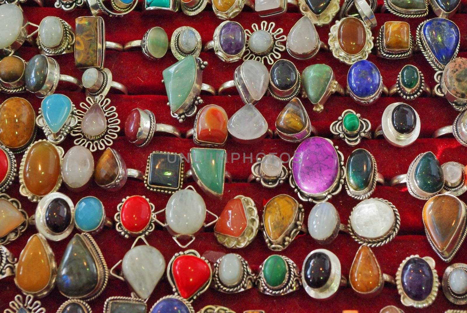 Close up image of luxury silver rings with semiprecious gems.