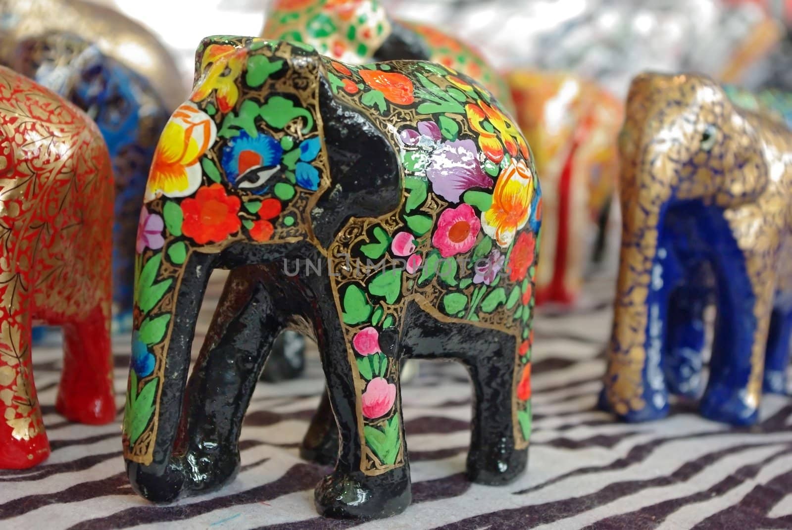 Handcraft wood elephant sculptures by Vitamin