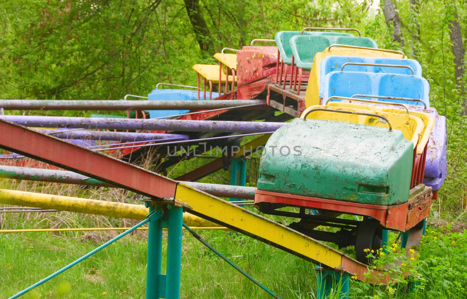 Abandoned attraction in old decayed amusement park