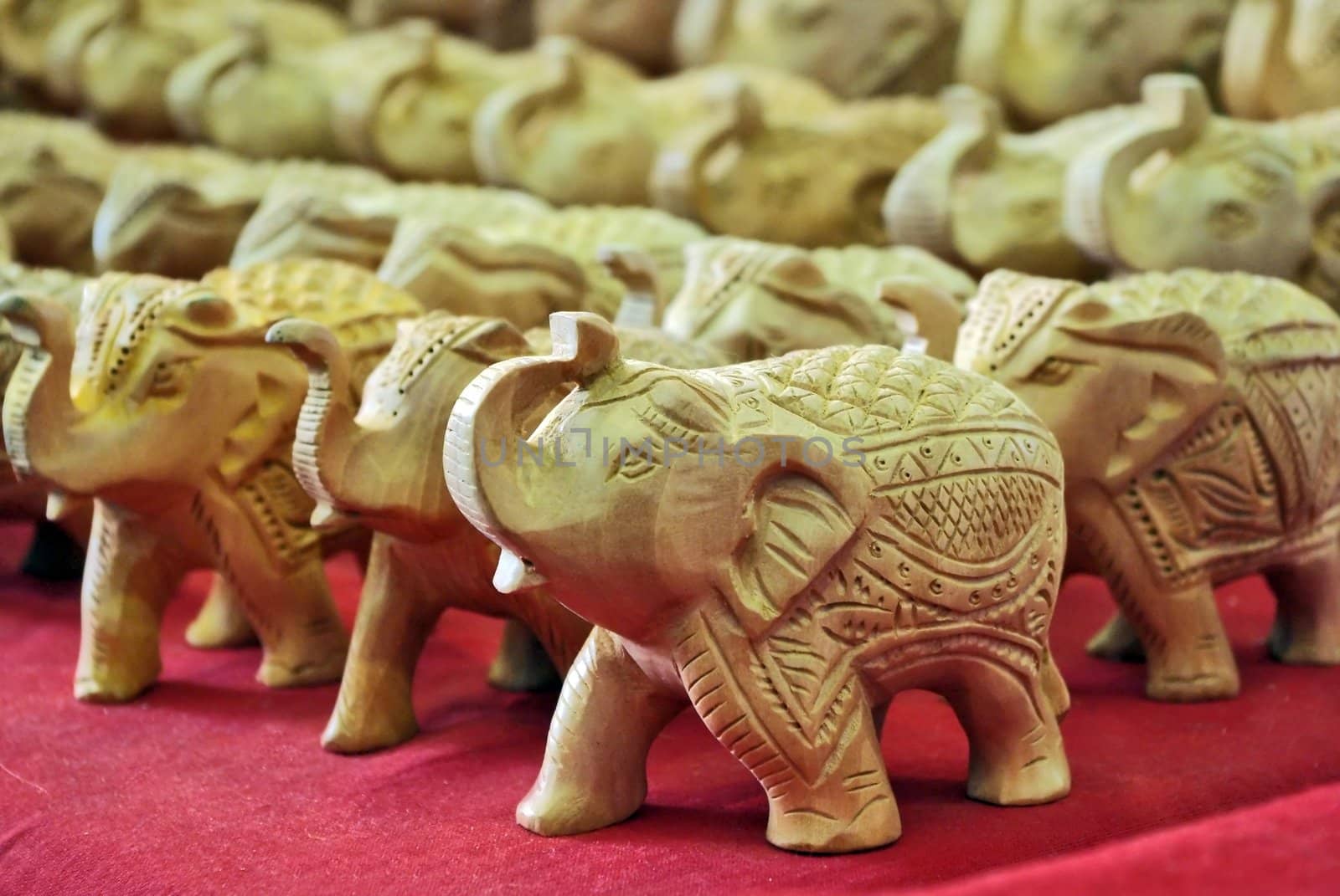 Handcraft wood elephant sculptures by Vitamin