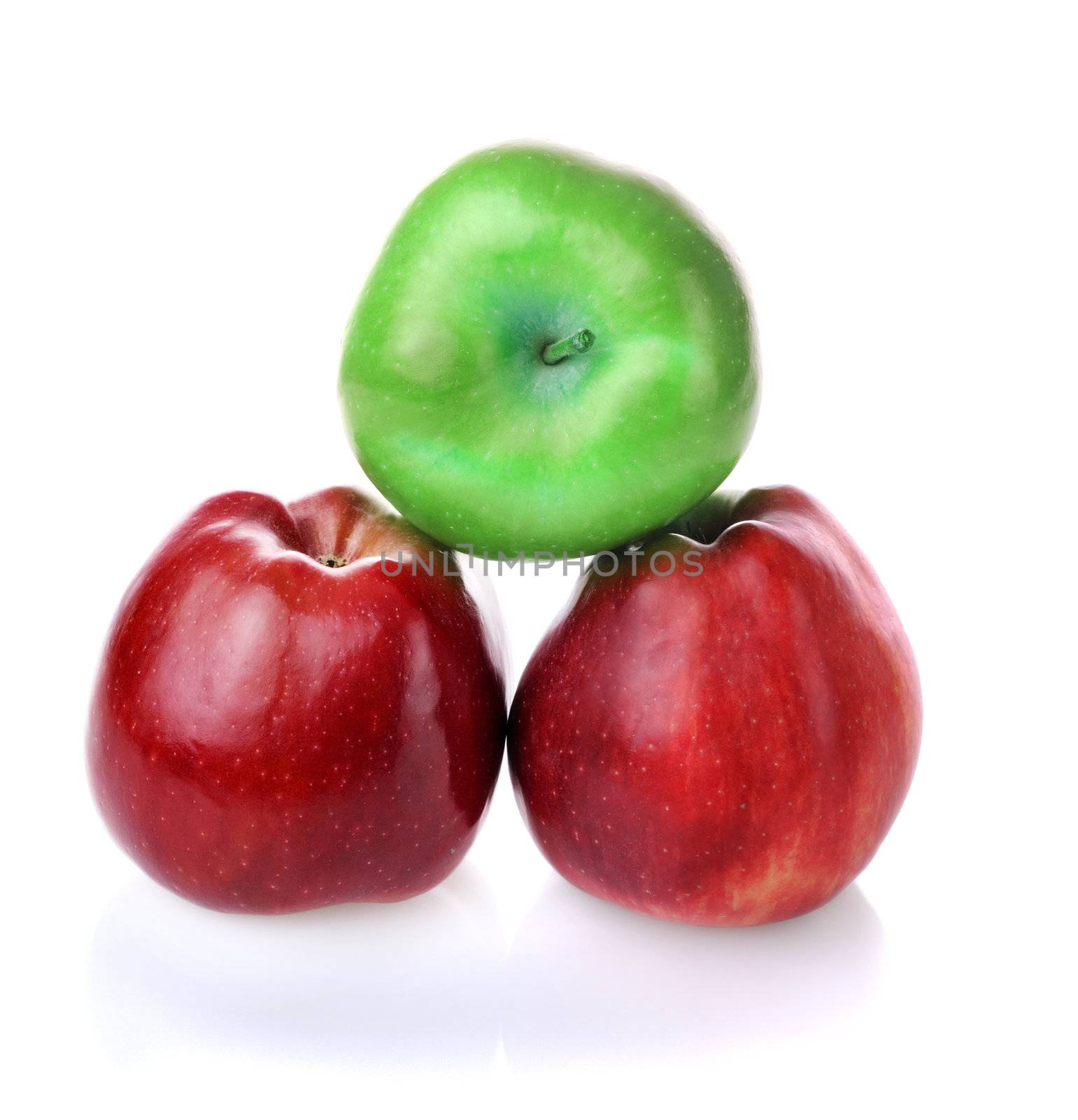 Pyramid with one green apples and two red apples on white background
