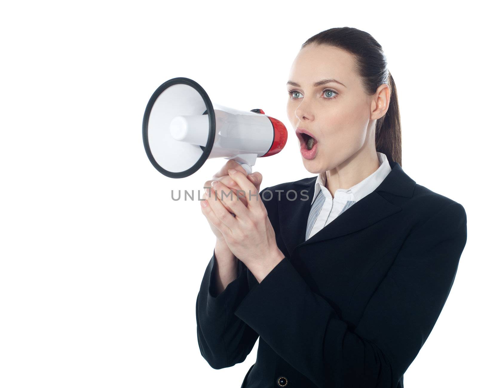 Business woman giving instructions with megaphone by stockyimages