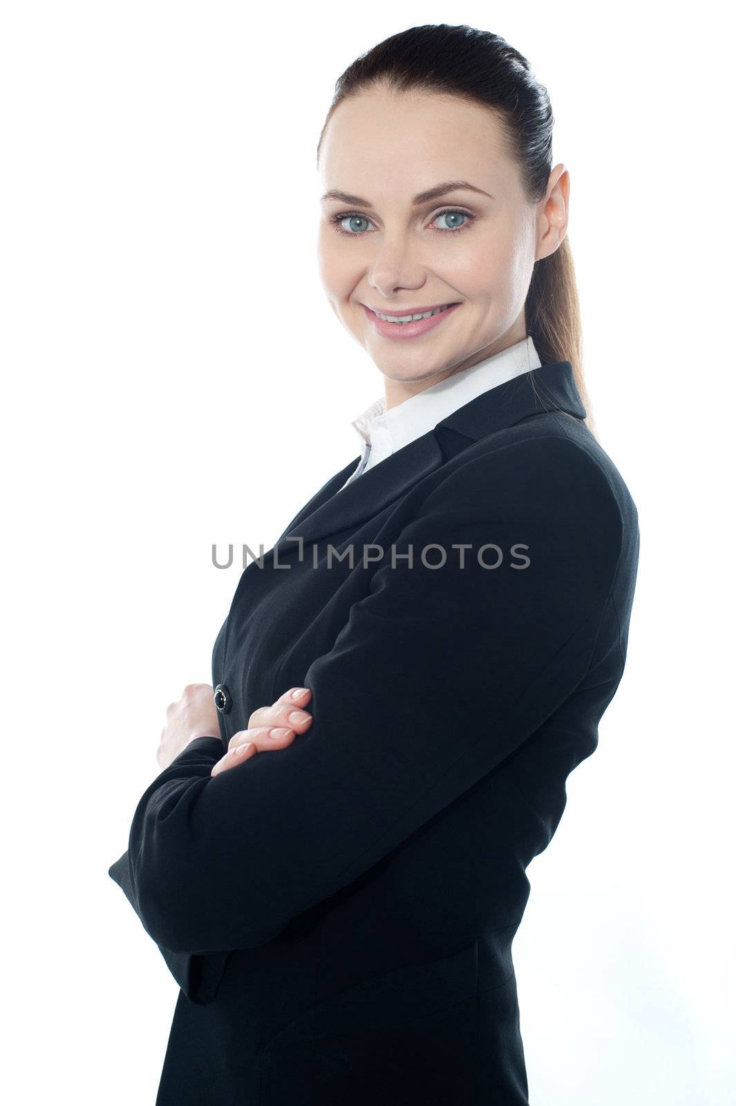 Closeup shot of successful businesswoman posing with crossed arms