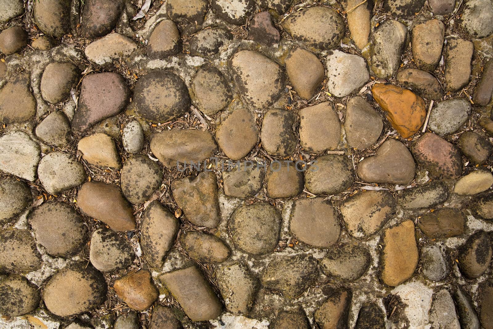 Close-up texture of old stone pavement 
