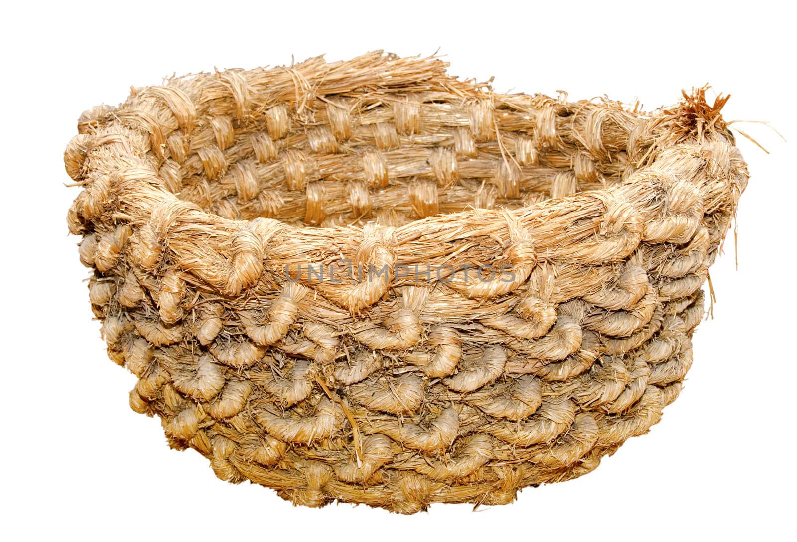 Hand-made straw basket to store dry things in a traditional village house, Ukraine