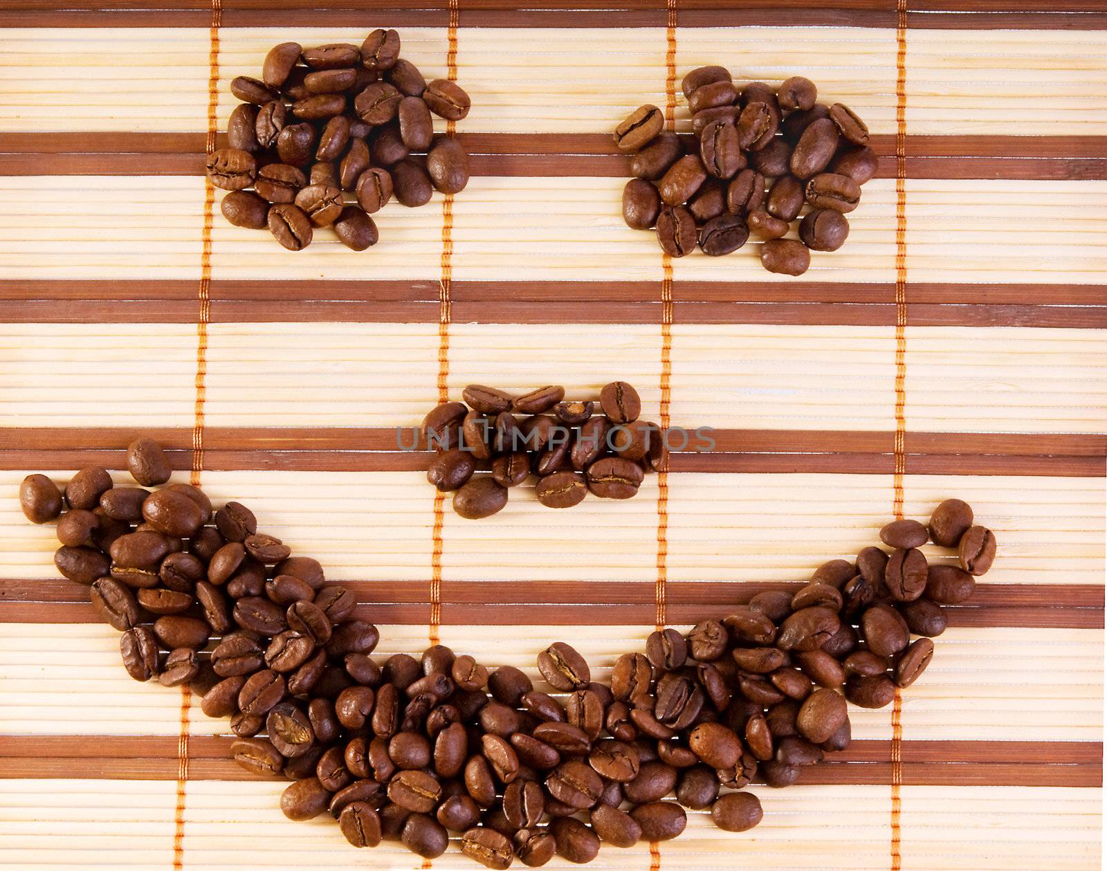 Smile with coffee beans on a mat by iryna_rasko