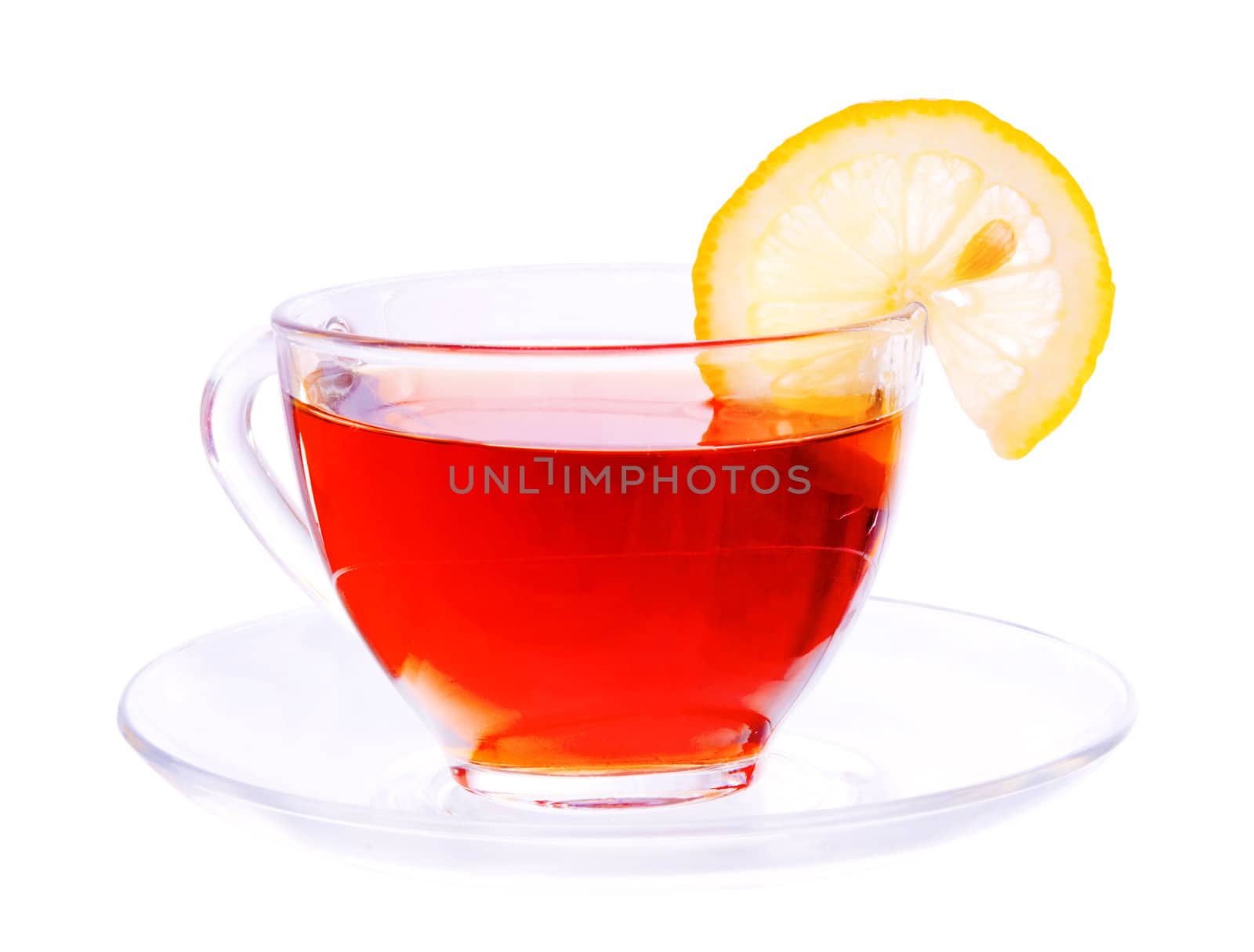 Transparent cup with tea and lemon segment by iryna_rasko
