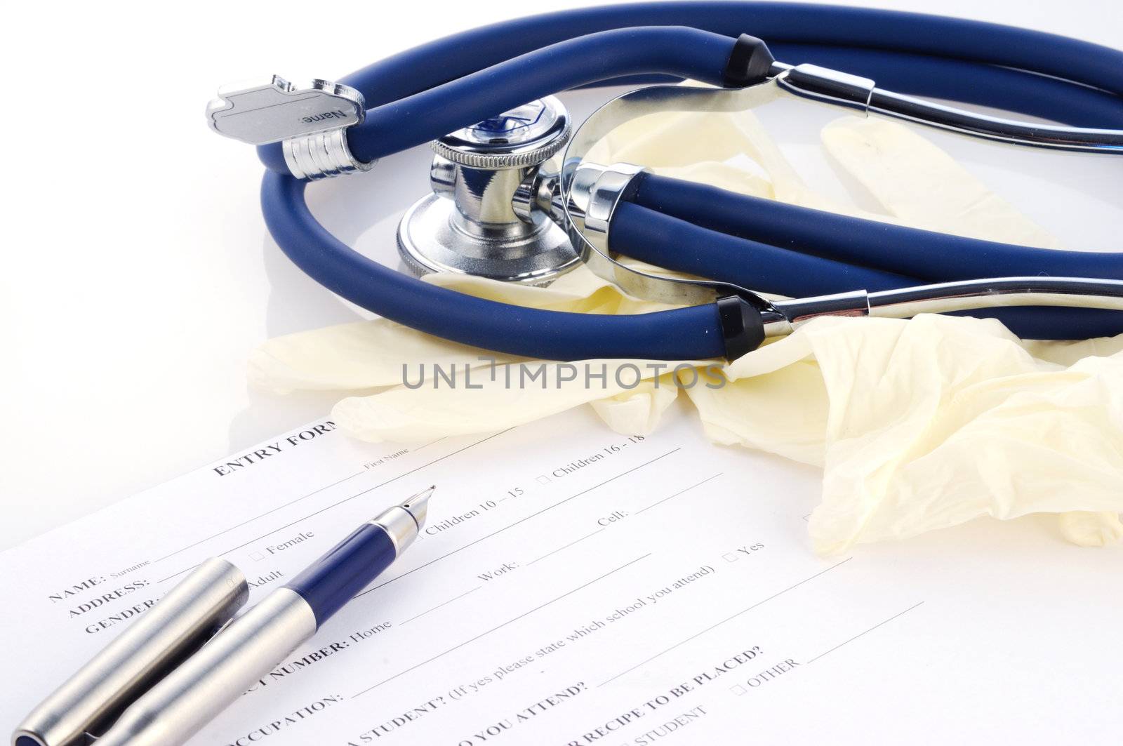 Form for medical examination with pen, gloves and phonendoscope..