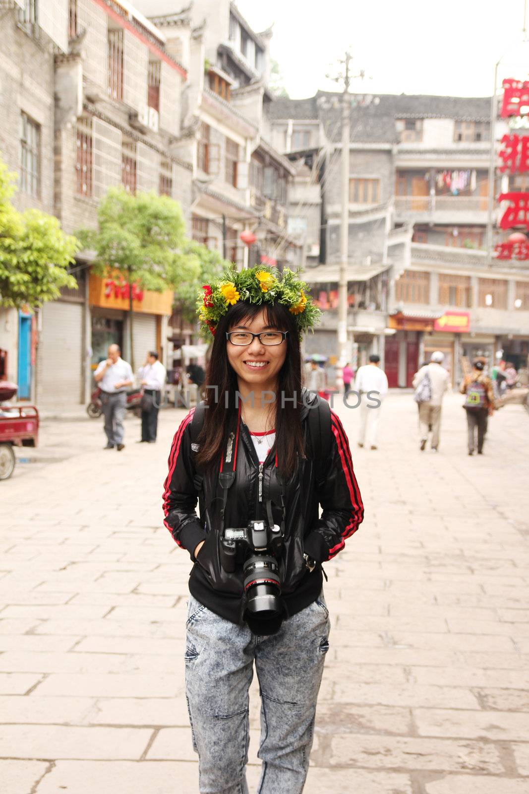 Asian woman travelling in China with her camera