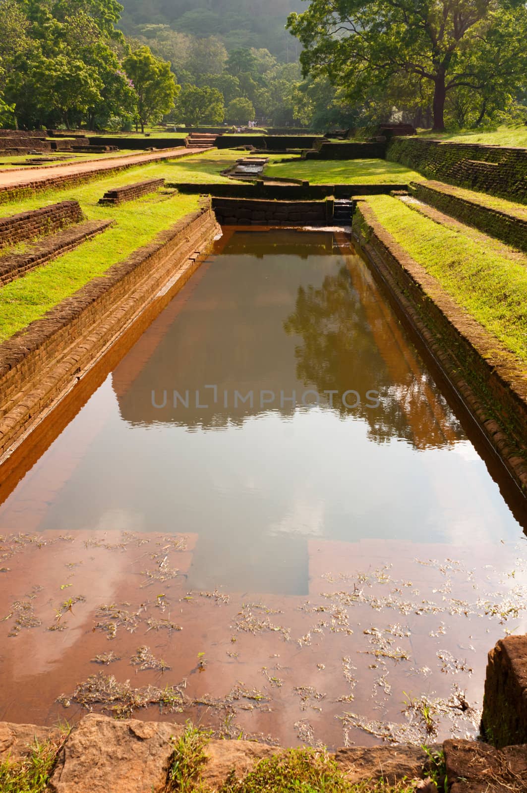 Ancient pool, fortress and palace on high Lion's rock , Sigiriya