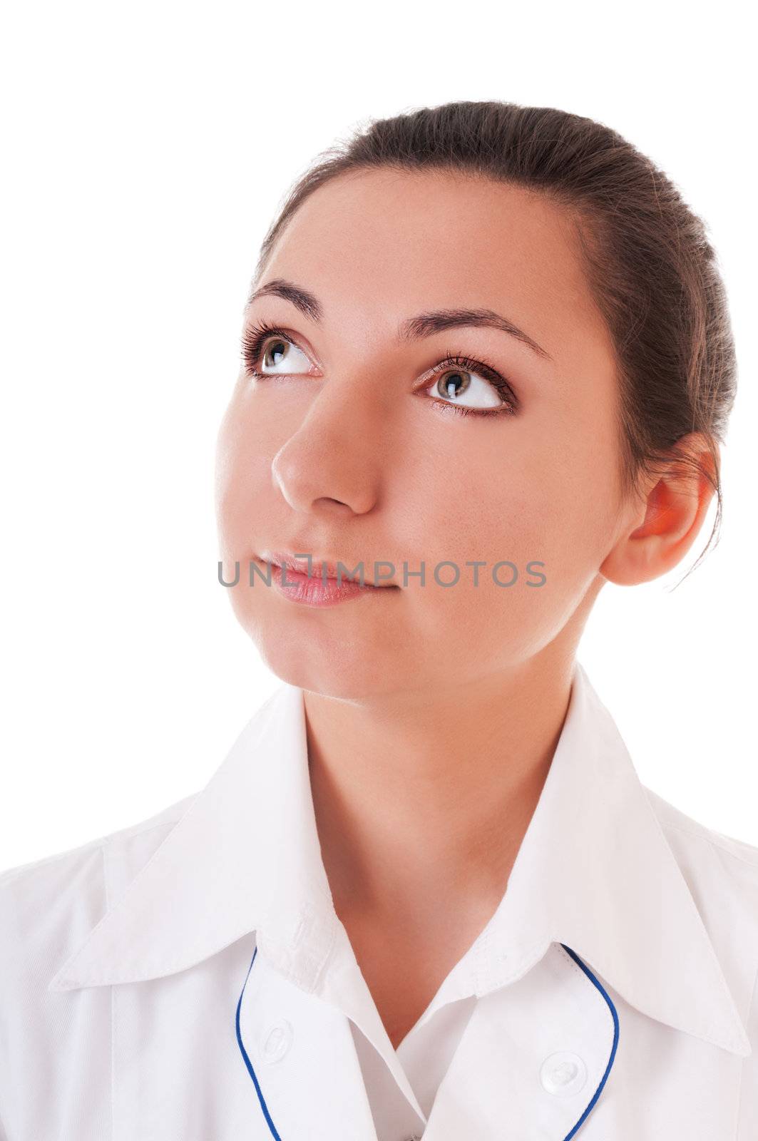 Portrait of serious woman in doctor's smockisolated on white background