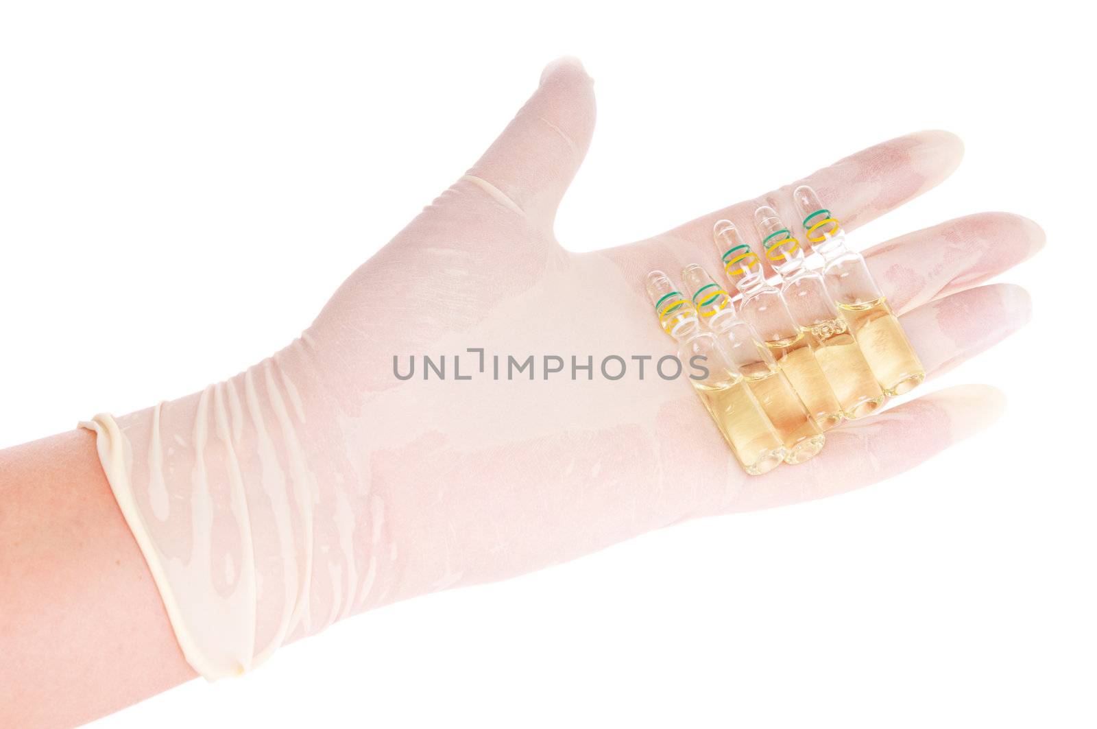 Hand in latex glove with ampules on white background