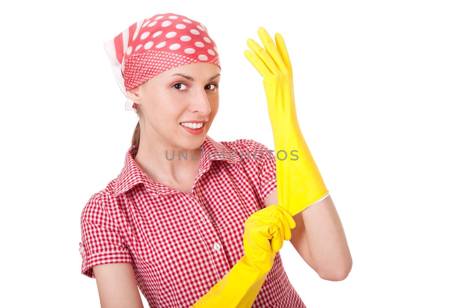 Young smiling charlady dresses yellow gloves.  Isolated over white background
